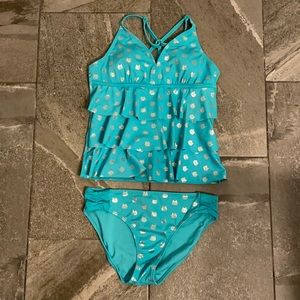 A blue cat two piece tankini bathing suit